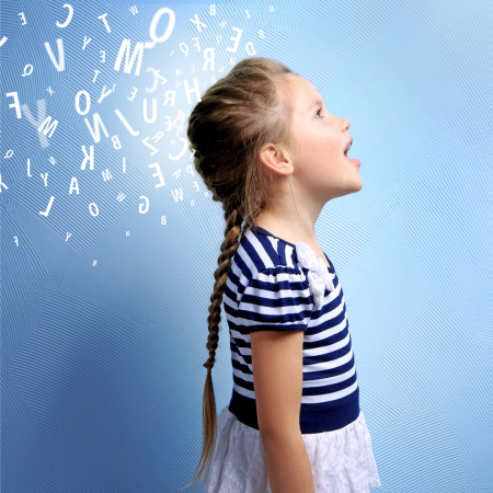 A young girl is surrounded by a cloud of letters.