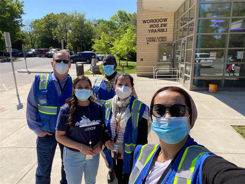 Community health workers outside Woodrow Wilson Library