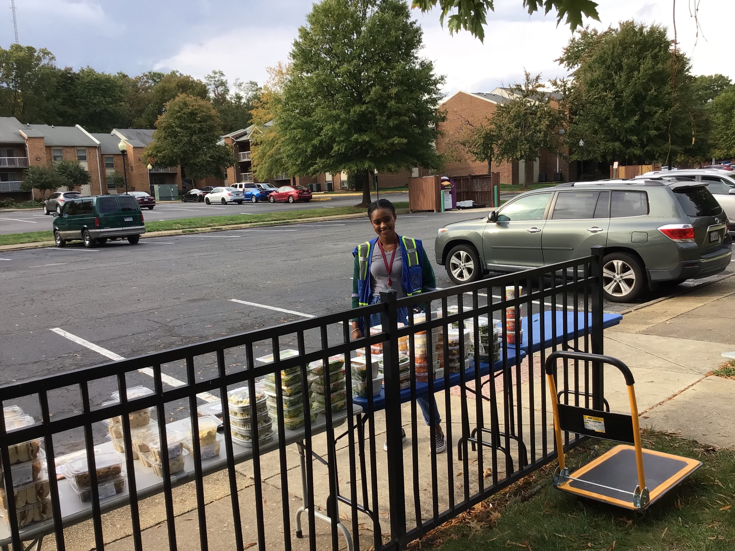 Community health worker at  United Community Creekside food distribution event