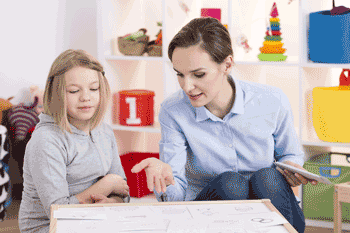 Photo of young girl at play therapy