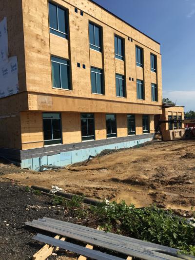 Side view of Outside of Bailey's Shelter and Supportive Housing construction, plywood exterior point of construction