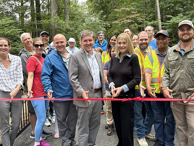 Fairfax County Supervisor Walter Alcorn and Claudia Diamond at the Old Courthouse Spring Branch restoration ribbon cutting