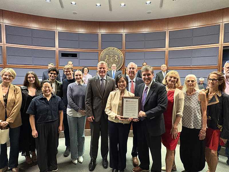 Supervisor Walter Alcorn presents a proclamation to Gin Dance Company