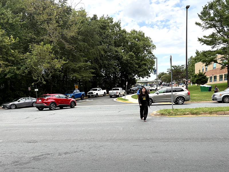 South Lakes High School student crossing the street