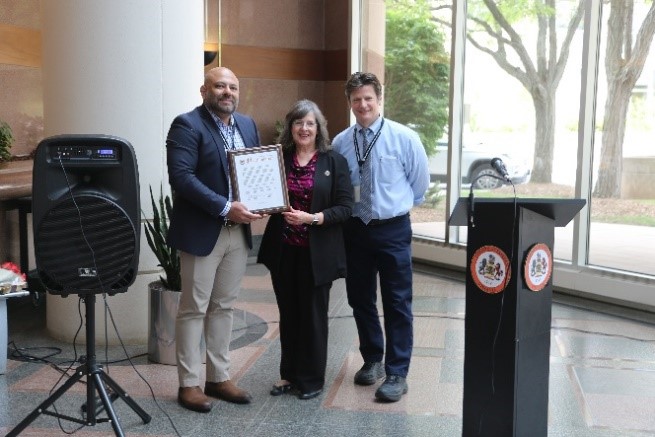 Fairfax County Building Official Jay Riat, Sully District Supervisor Kathy Smith and Land Development Services Director Bill Hicks.