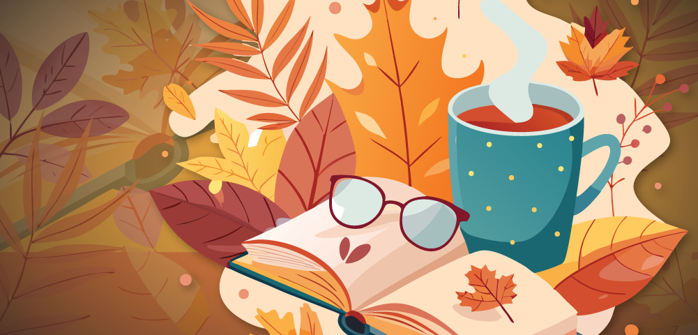 Fall leaves, reading glasses and a book