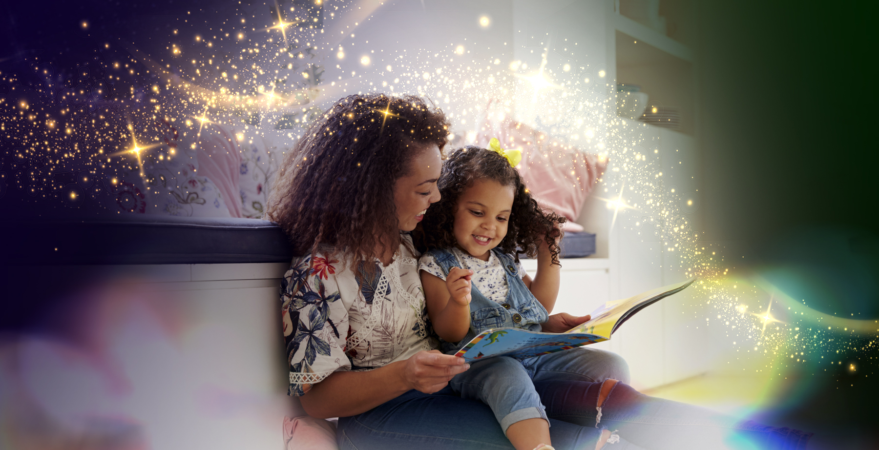 A woman reading to a child.