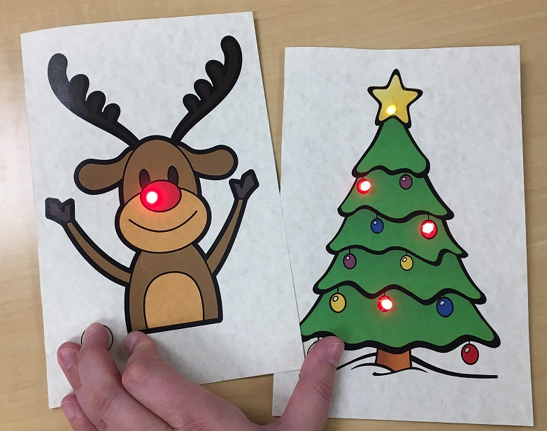 Photo of Reindeer and Christmas Tree designs on DIY light-up cards