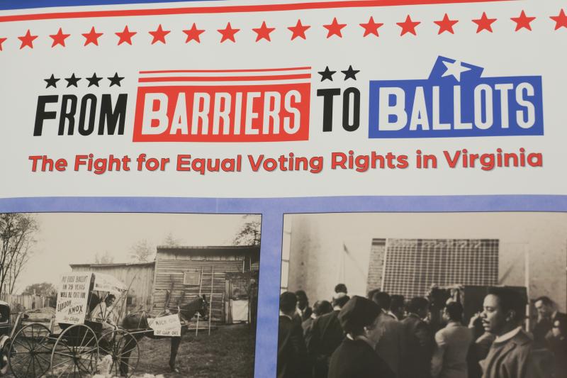 From Barriers to Ballots exhibit with photos of MLK Jr. and others