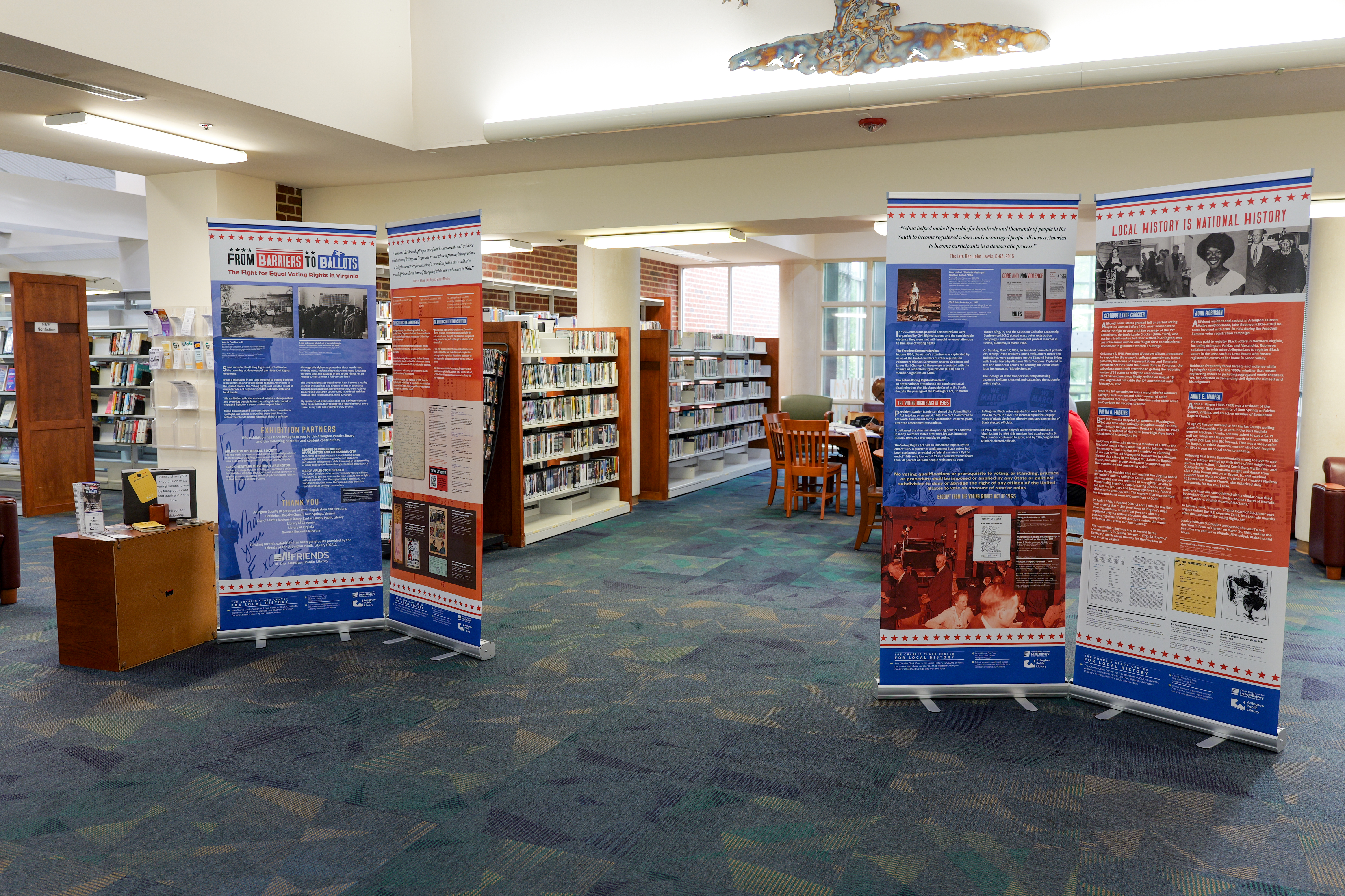 From Barriers to Ballots distance photo of all four exhibit panels