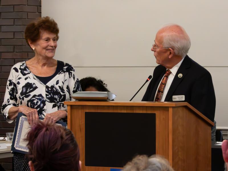 Library Board of Trustee Chair Brian Engler Presents Friends Choice Award to Honoree