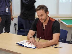 Author Ben Hatke signs books at Fandomania on Saturday, May 20, 2023