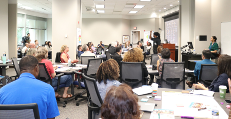 Audience attentively listens to engaging speaker