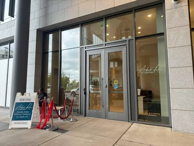 glass front door of Arbor Row Center