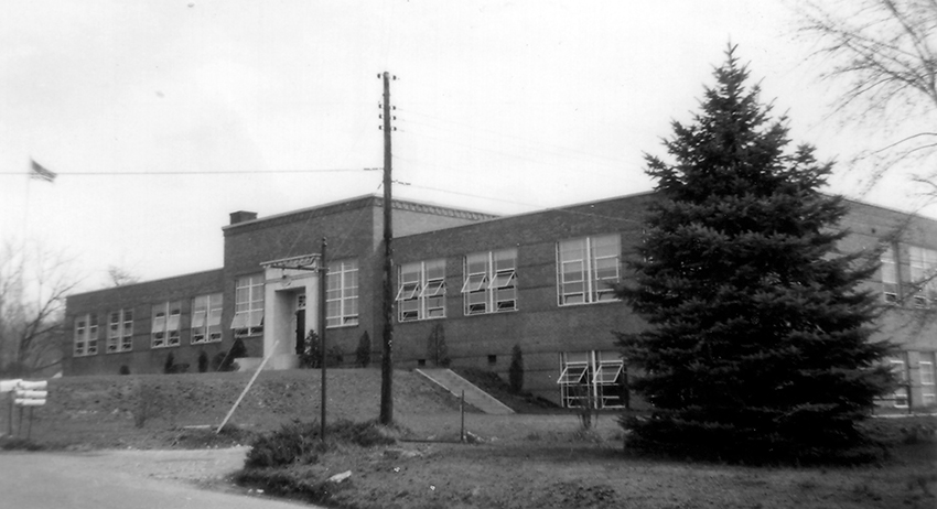 An old school building exterior in 1954.