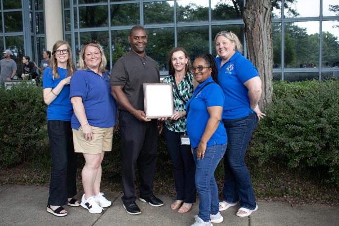 group of people with award 