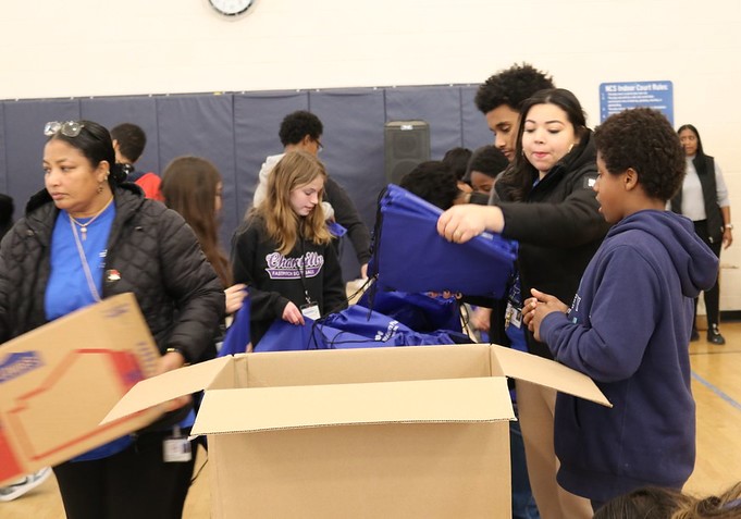 Teens loading boxes 