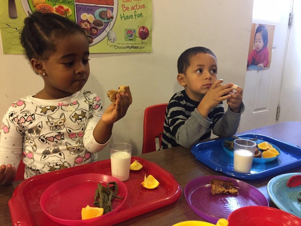 two children eating