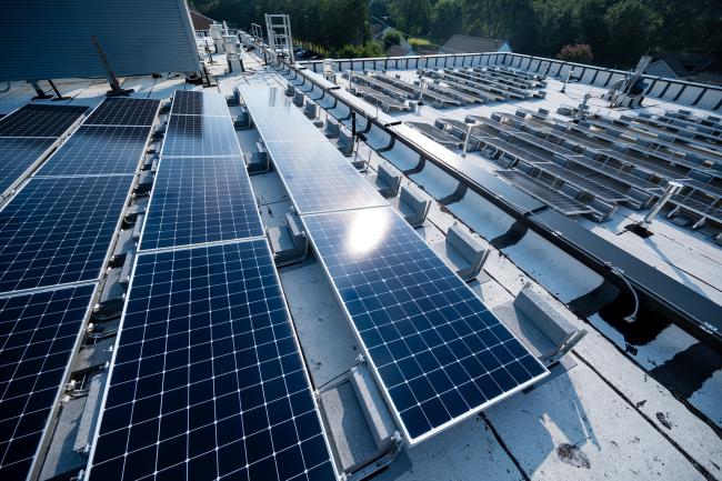 Image of rows of solar panels on the roof of the Woodlawn Fire Station 24