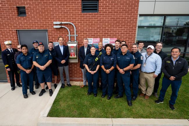 County leaders with fire crew outside of fire station 24 