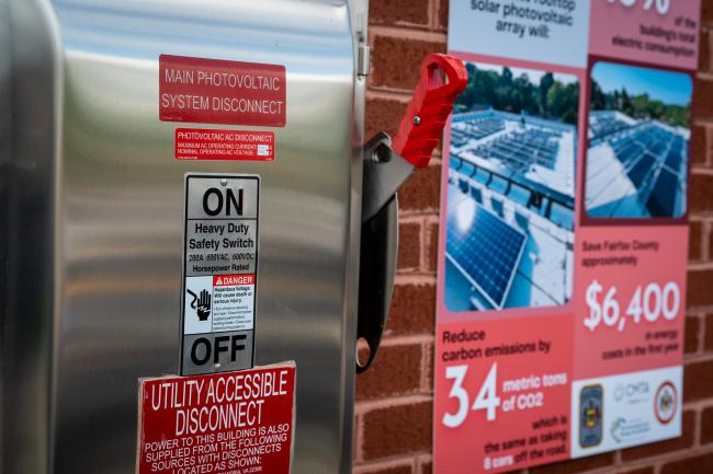 Image of solar panel switch lifted to "on" 