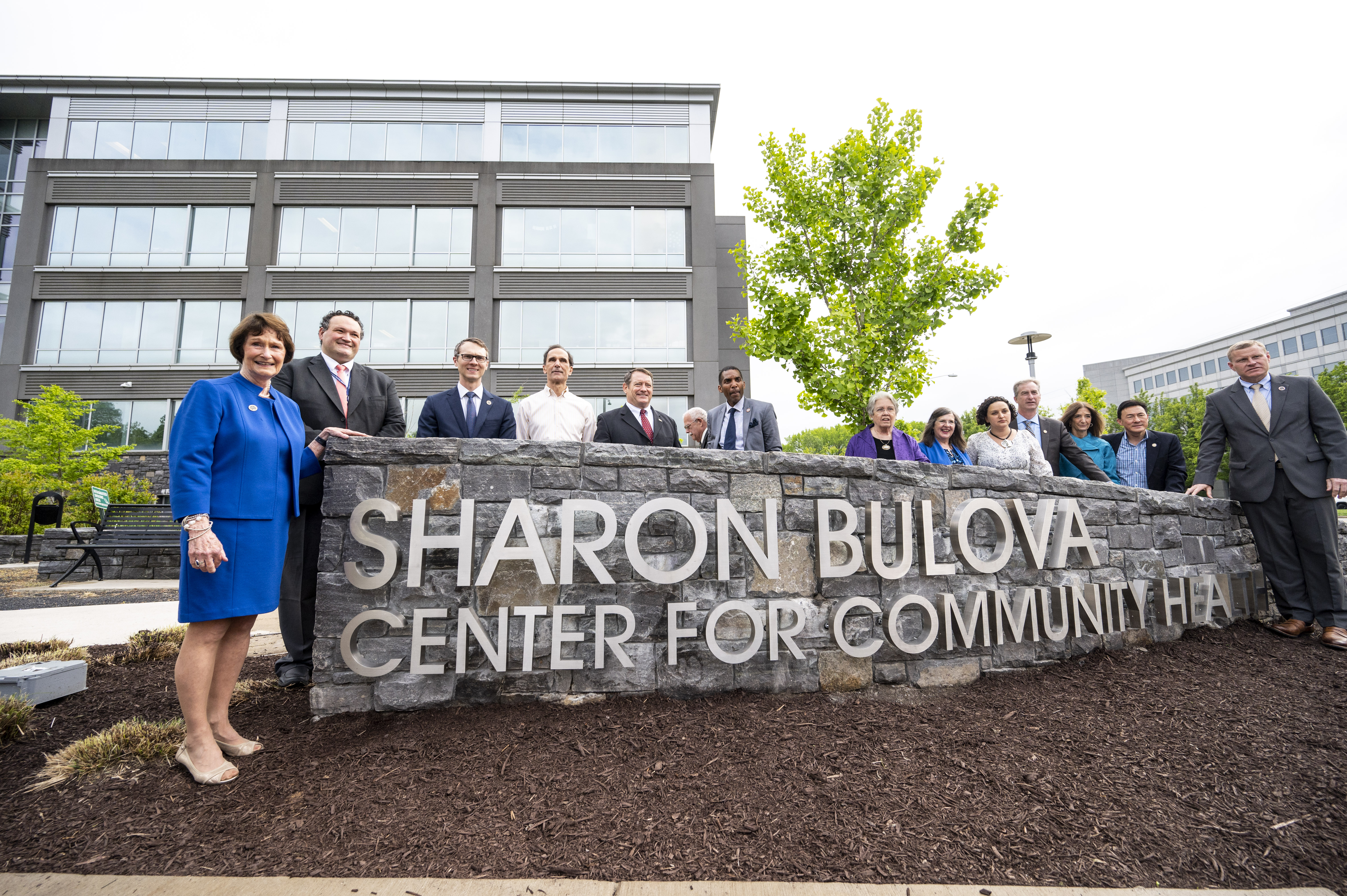 photo of Sharon Bulova and other officials standing near new Sharon Bulova Center sign photo of Sharon Bulova and other officials standing near new Sharon Bulova Center sign