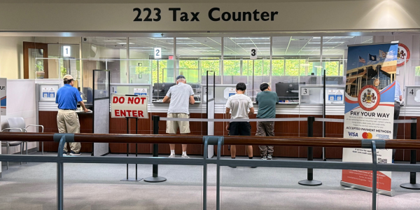 DTA Tax Counter People paying their taxes at a counter in the Government Center