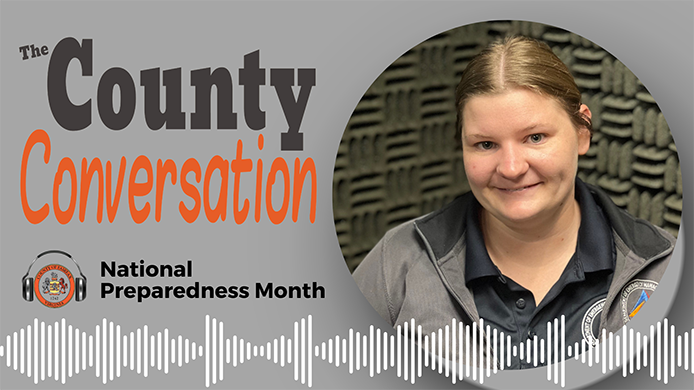 A promotional graphic for "The County Conversation" podcast highlighting National Preparedness Month, featuring a soundwave design, the Fairfax County seal, and a profile photo of guest speaker Ashley Shifflett.