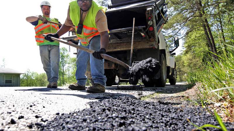 filling a pothole filling a pothole