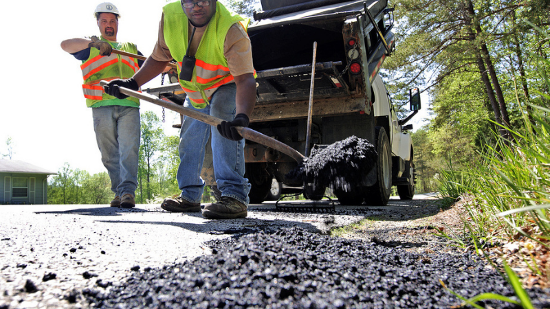 filling a pothole