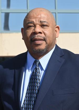 Office of Human Rights and Equity Programs Director Michael Simms in front of the Fairfax County Government Center