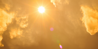 sun shining amid clouds 