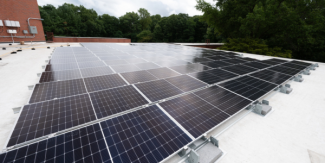 Image of solar panels on the top of the Reston Community Center.