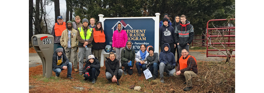 Historic Site Volunteer Corps members pose outside Stempson House.