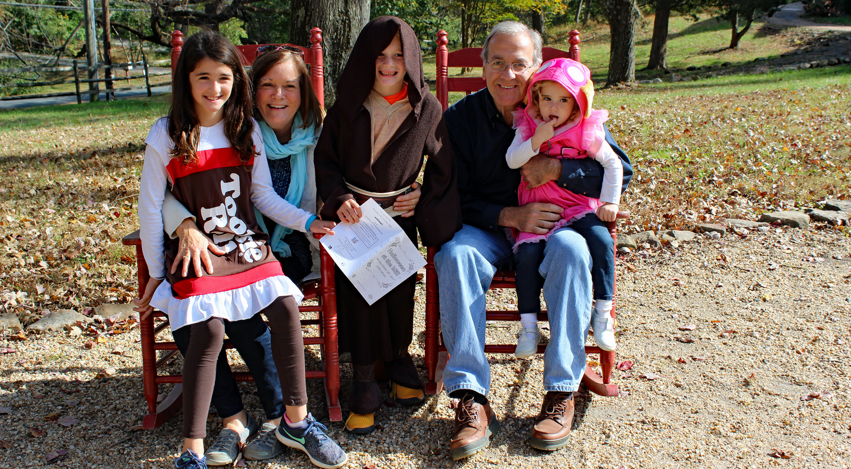 A family poses in dressup for Halloween