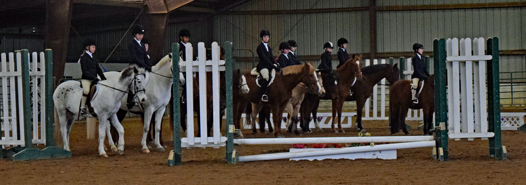 Equestrian riders awaiting a competition