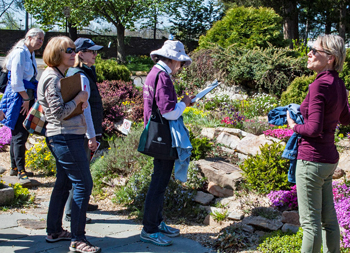 A Master Gardener leads a tour through Green Spring Gardens