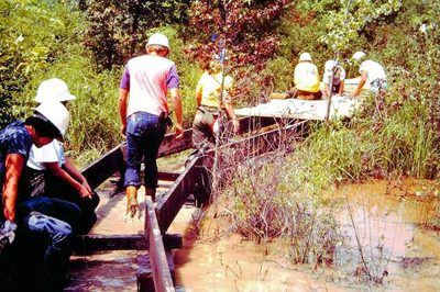 Youth workers building the boardwalk