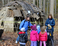 A guide explains the workings of an Indian shelter