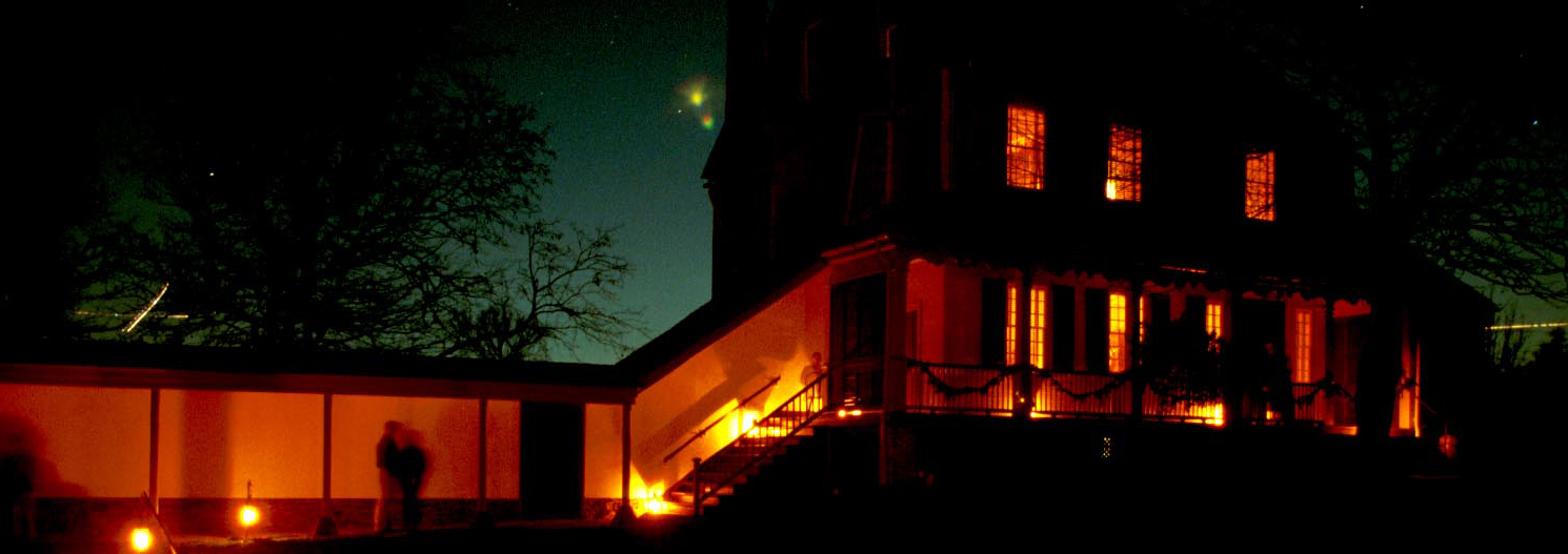 Sully's main house lit by candlelight