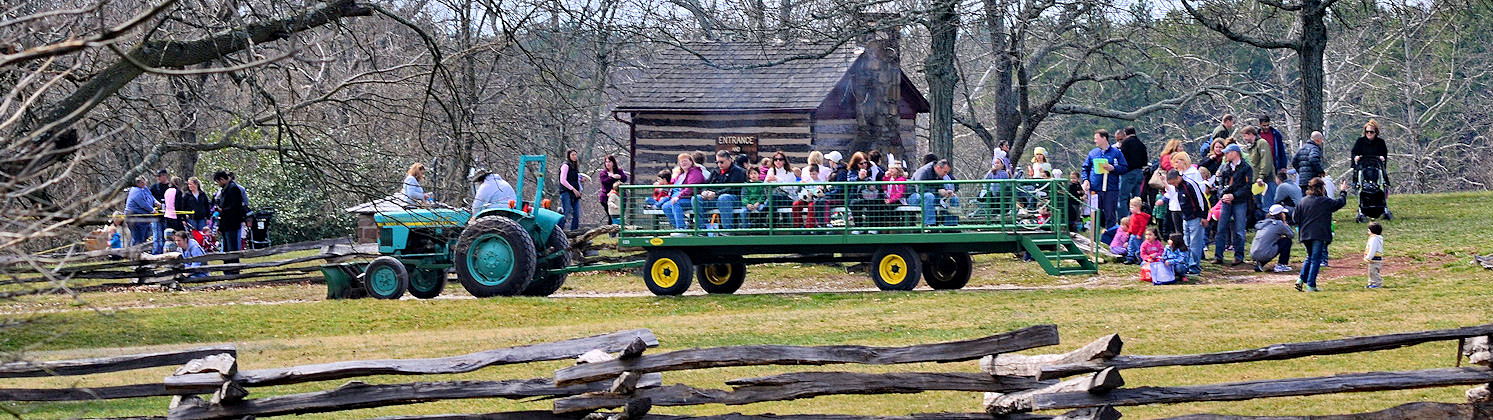 A large group of people on a wagon ride
