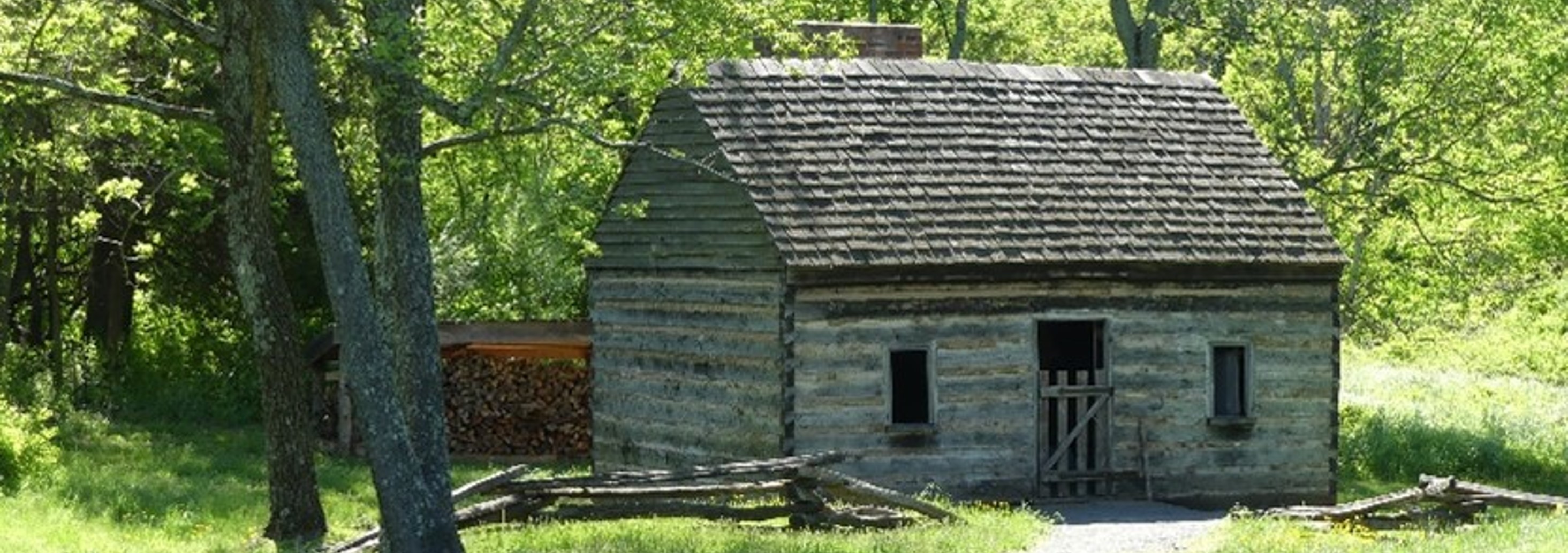 an outbuilding at Sully Historic Site during springtime