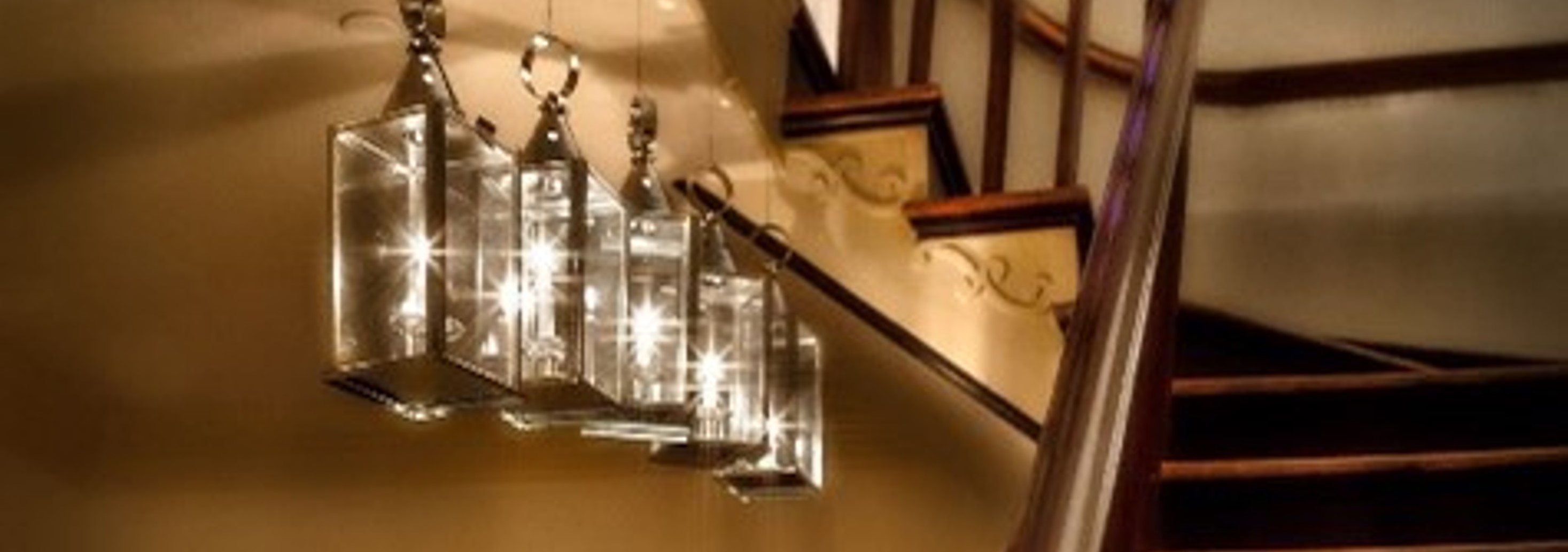 a staircase and lights in the main house