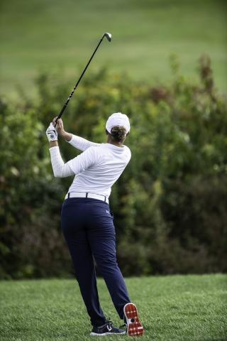 Person golfing