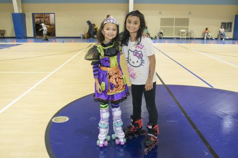 Two girls on skates