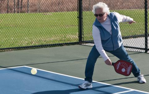 woman playing pickleball