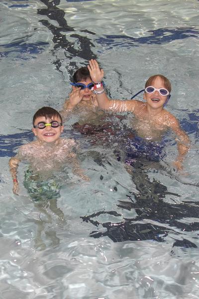 image of boys swimming in pool
