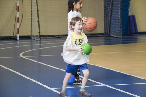 kid playing ball