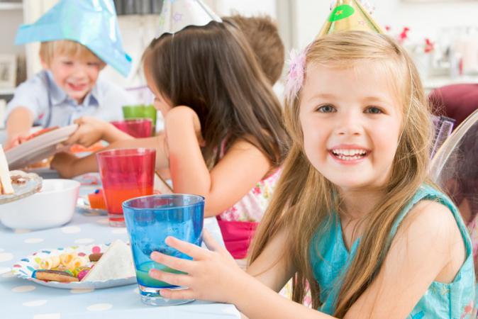 Child celebrating a birthday with friends