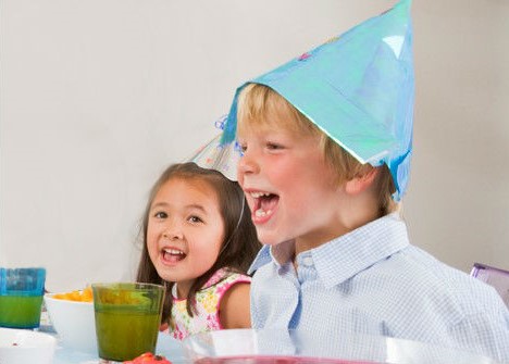 Child celebrating a birthday with friends
